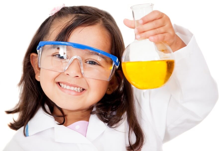 Happy little girl scientist